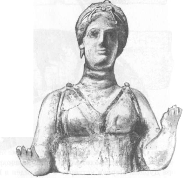 64. Кора-Персефона в хитоне, завязанном под грудью, с диадемой и лентами в волосах и крупными серьгами в ушах. Ольвийская терракота. III в.